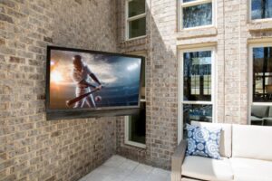 Residential TV wall mounting with hidden cable management
